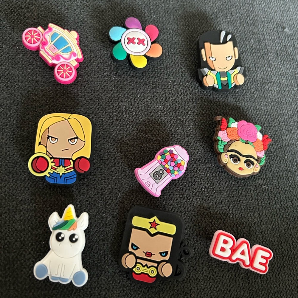 Croc charms . Wonder women , pink